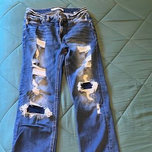 lightly distressed jeans size 27